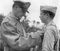 Gen. Douglas MacArthur awarding Medal of Honor to Bong
